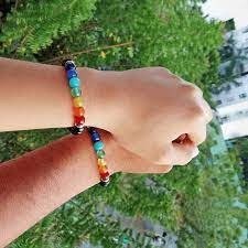 PULSERA PAREJAS 7 CHACKRA AMARRA + CAJA - Barrio Meiggs